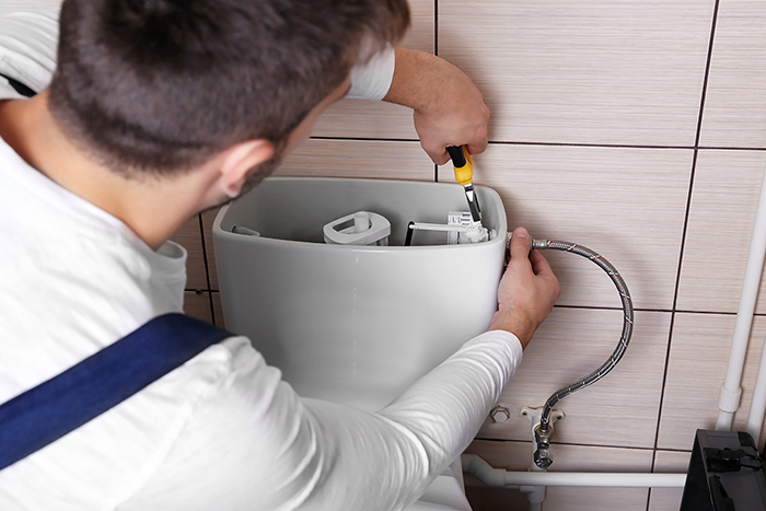 Guidance on deciding whether to repair or replace a toilet, offered by Water Heater Repair Grand Prairie TX based on the condition and age of the unit